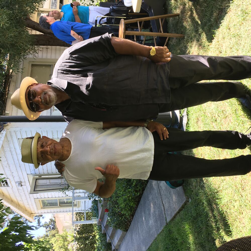 Ron Burris with a friend after a performance